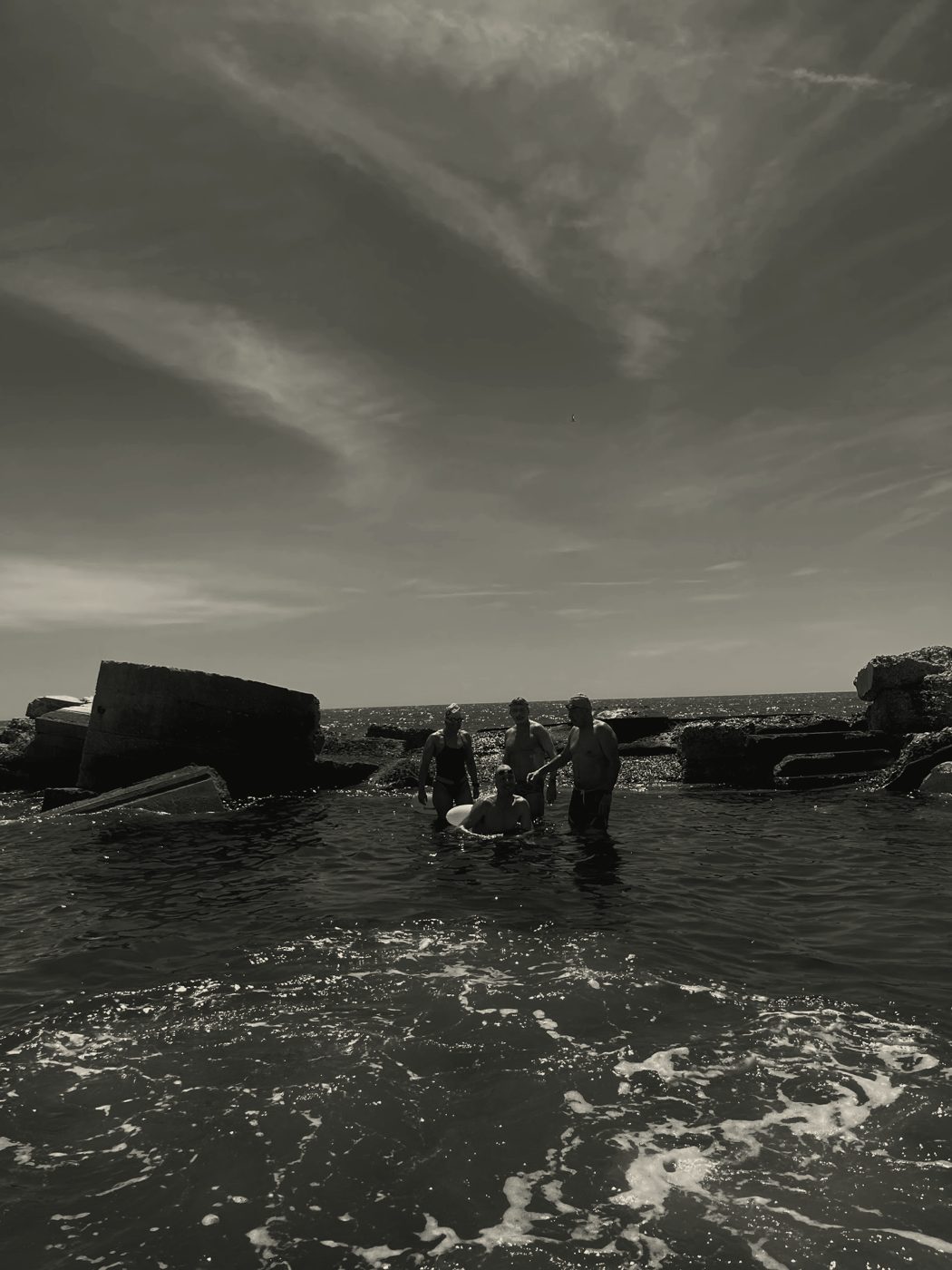 Open-water swim start in choppy surf