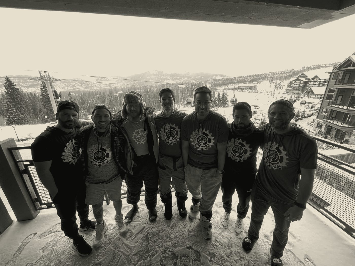 Team in matching shirts on a rooftop